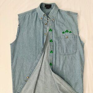 Denim sleeveless button up shirt with embordered green shamrock details